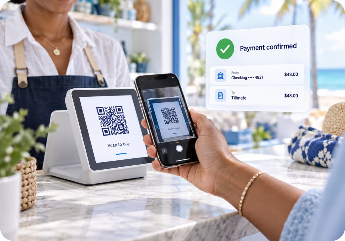 A customer paying at the counter by scanning a QR code, with the payment confirmed